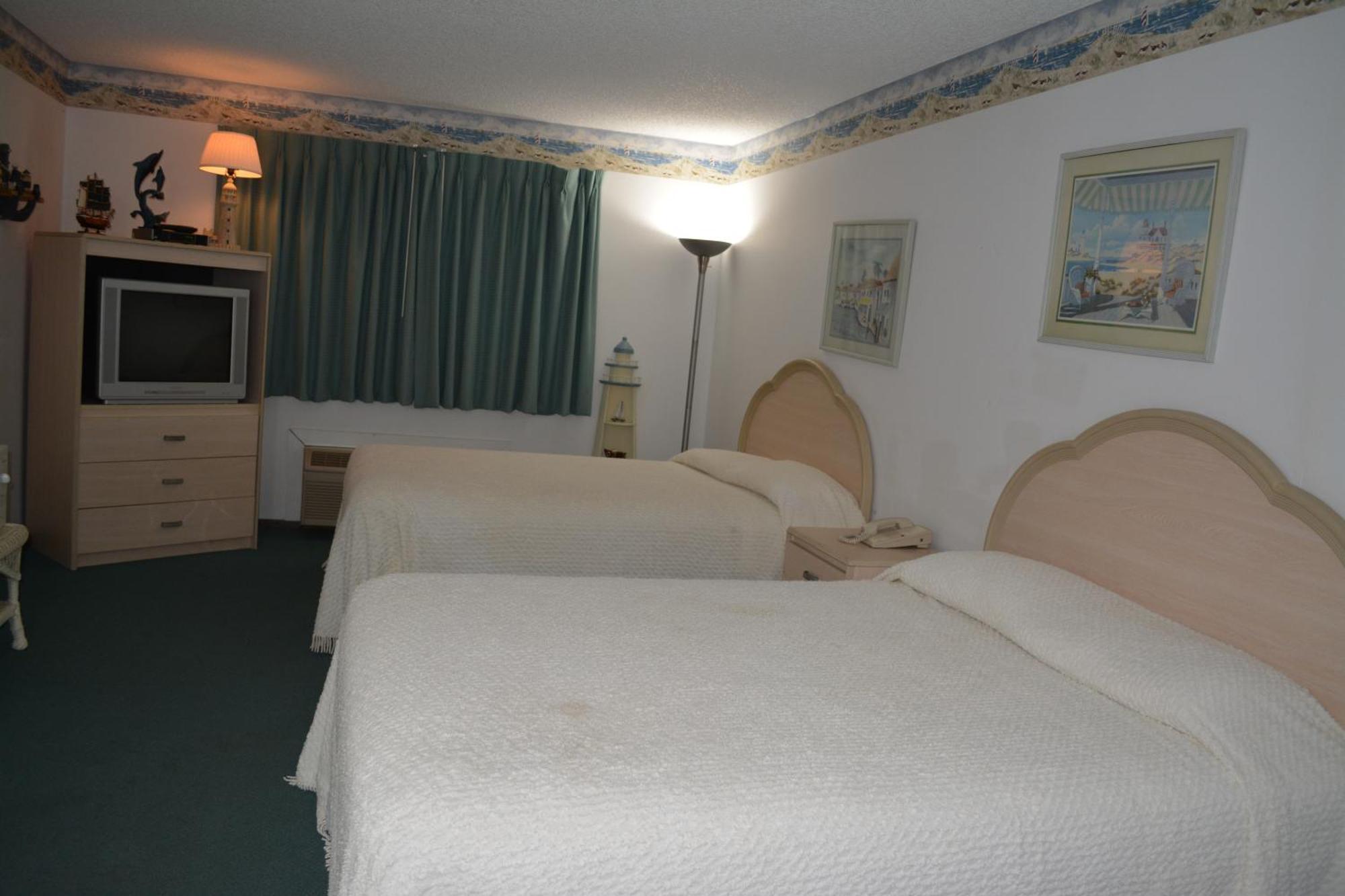 Bloomer Inn & Suites Pokoj fotografie